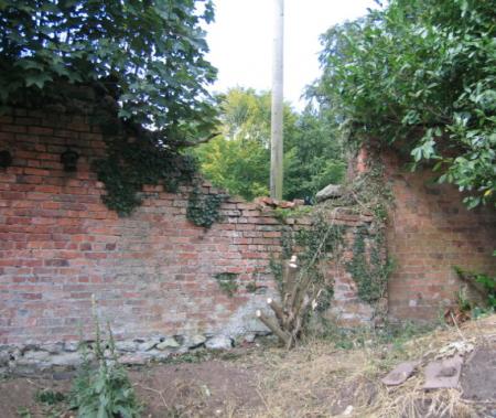 Part of the collapsed boundary wall
