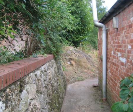 Collapsed retaining wall